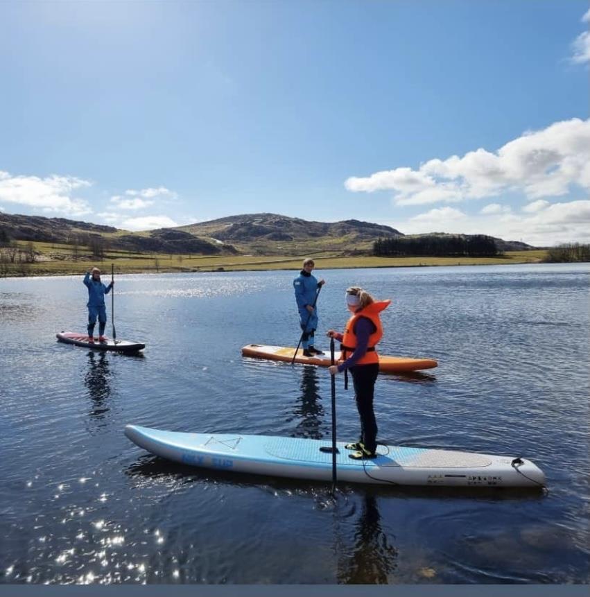 Stand up paddle på Ogna. Foto - Klikk for stort bilete